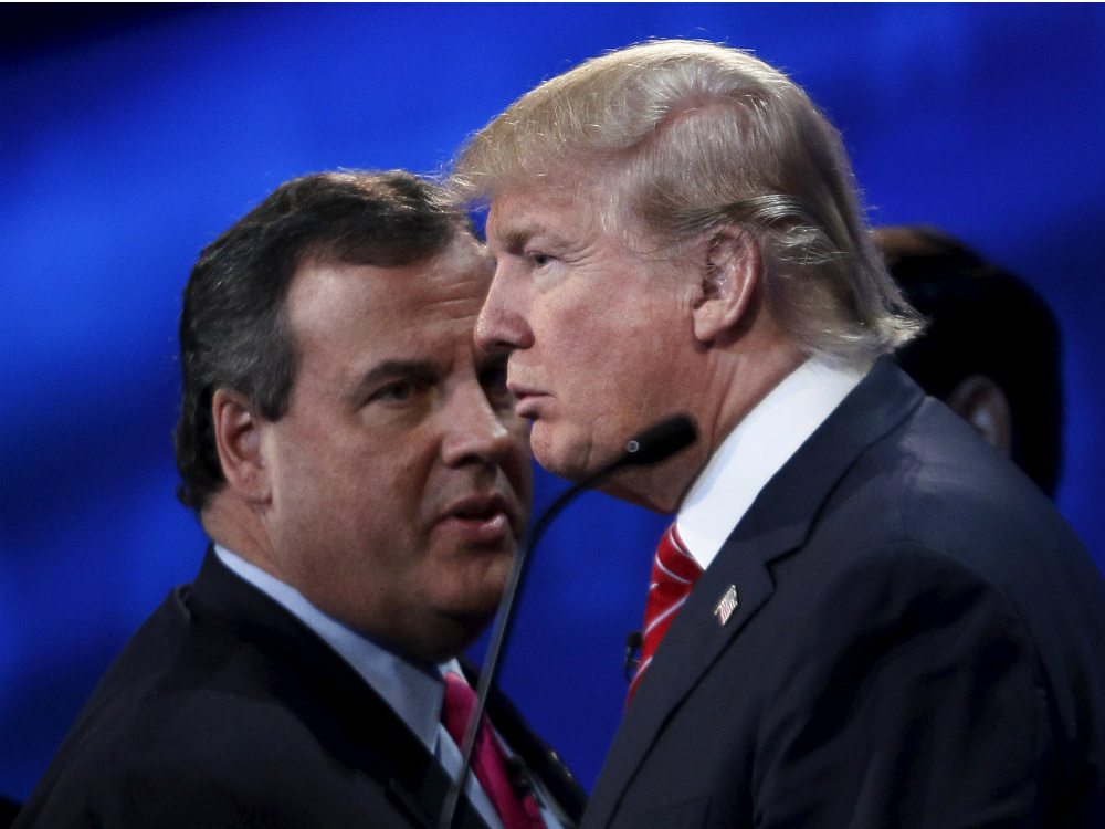 Os pré-candidatos Chris Christie e Donald Trump durante o terceiro debate republicano, no Colorado