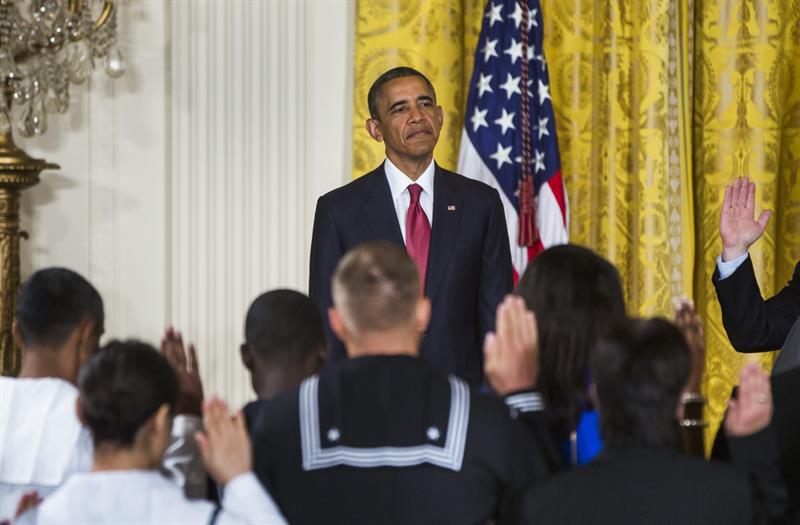 O presidente americano Barack Obama discursa na presença de estrangeiros que lutaram pelos EUA em guerras