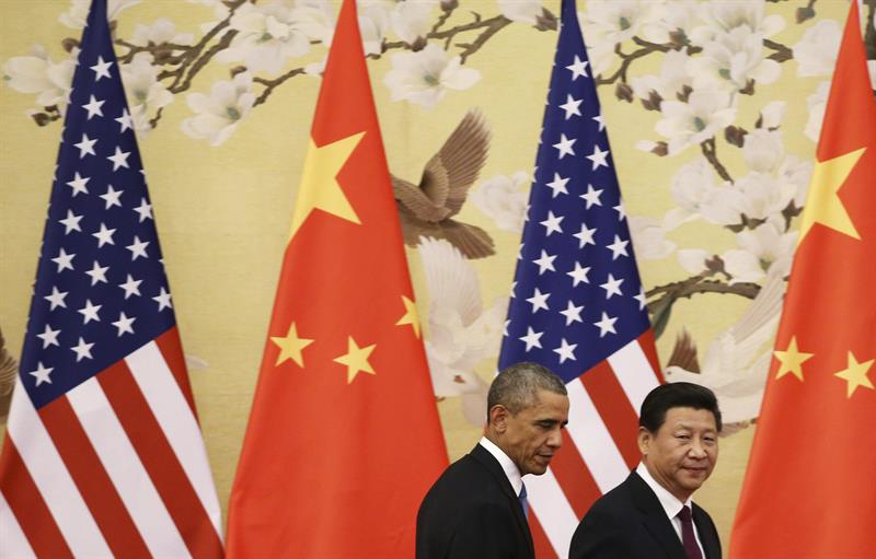 Os presidentes dos EUA e da China, Barack Obama e Xi Jinping