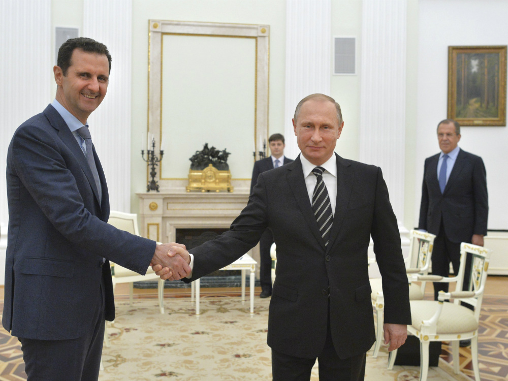 O ditador sírio Bashar Assad e o presidente russo Vladimir Putin encontram-se em Moscou