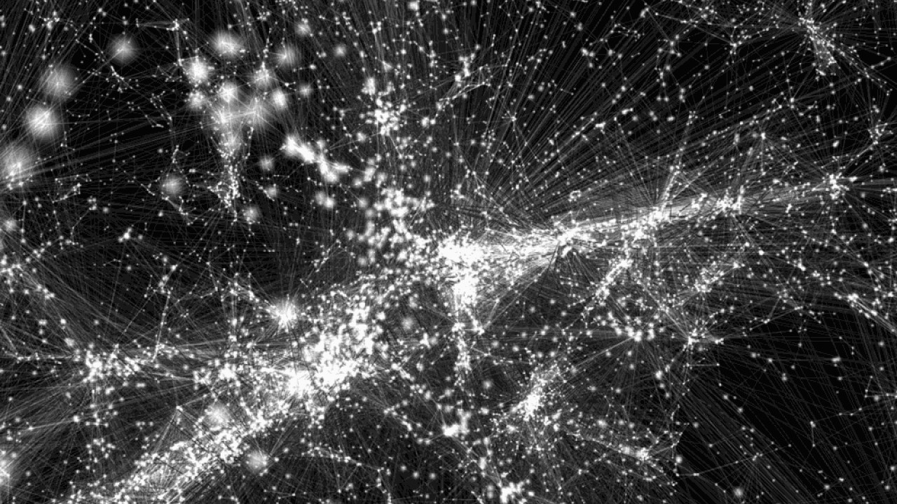 Em preto e branco, o design do "mapa" lembra um jogo de ligar os pontos, onde os objetos brilhantes são as galáxias e as linhas são os filamentos de gás que conectam uma a outra