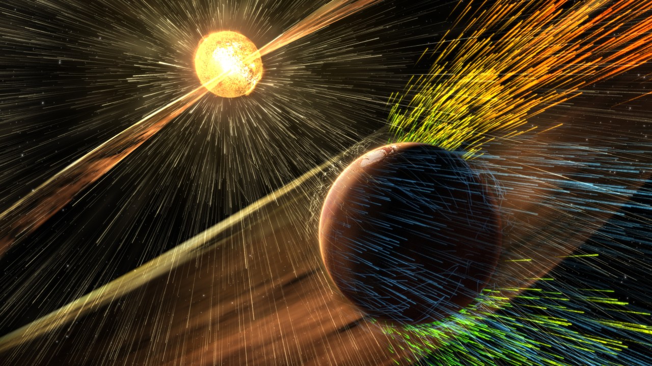 Concepção artística feita pela Nasa de uma tempestade solar "arrancando" a atmosfera de Marte