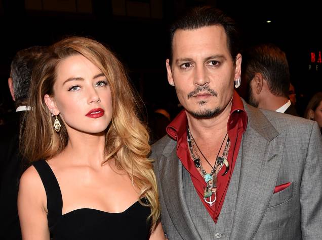 Johnny Depp e Amber Header comparecem ao Festival Internacional de Filmes de Toronto, no Canadá