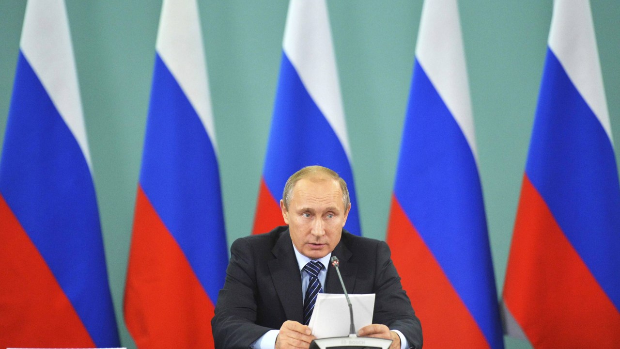 O presidente Vladimir Putin durante reunião dedicada à preparação de atletas russos para as Olimpíadas de 2016 no Brasil, em Sochi, Rússia