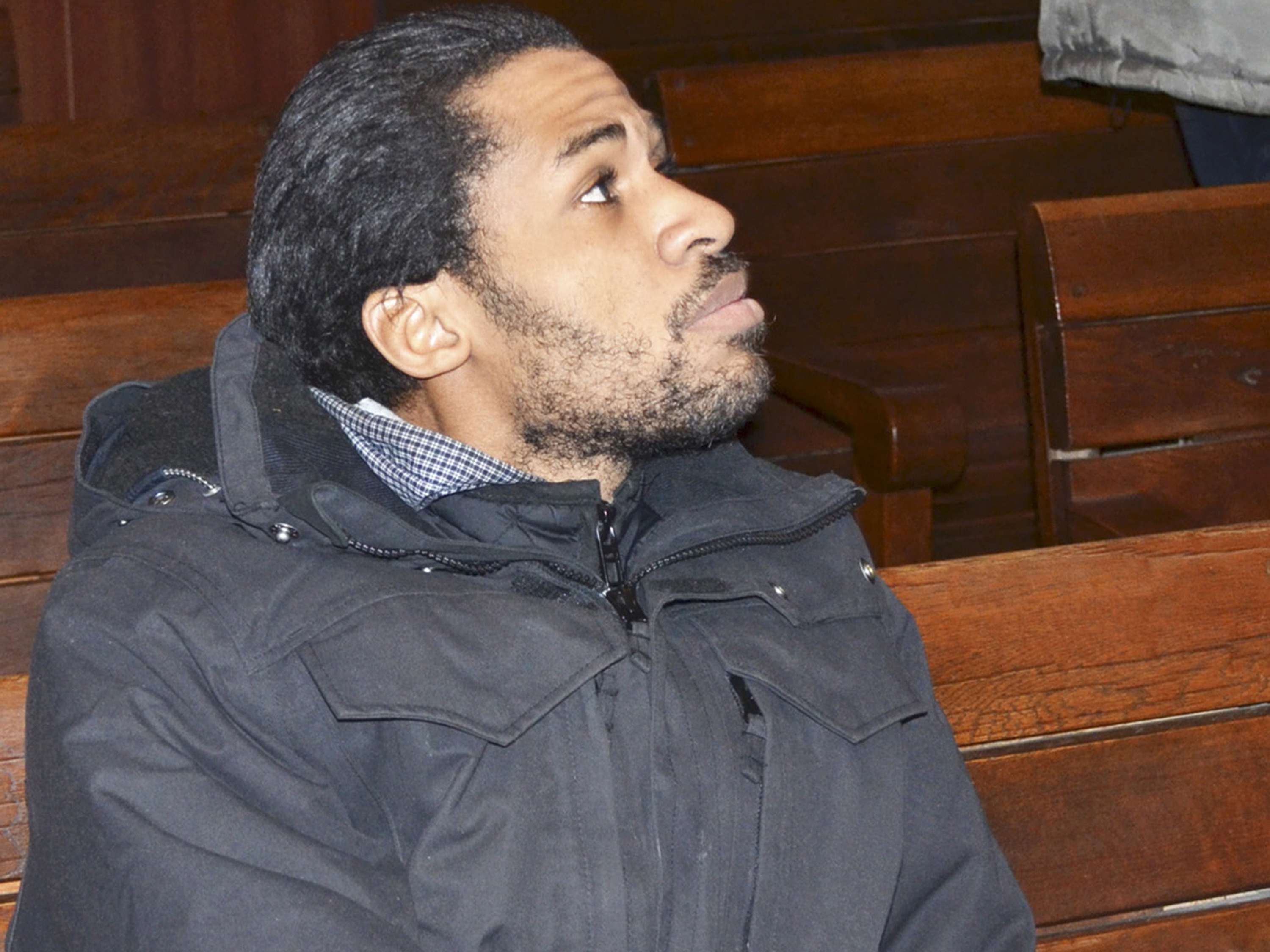 O cidadão francês Fritz-Joly Joachin, de 29 anos, é visto em tribunal de Haskovo, Bulgária. Preso por ter tentado viajar à Síria, ele é suspeito de ter mantido vínculos com Chérif Kouachi, um dos autores do ataque ao 'Charlie Hebdo'O cidadão francês Fritz-Joly Joachin, de 29 anos, é visto em tribunal de Haskovo, Bulgária. Preso por ter tentado viajar à Síria, ele é suspeito de ter mantido vínculos com Chérif Kouachi, um dos autores do ataque ao 'Charlie Hebdo'
