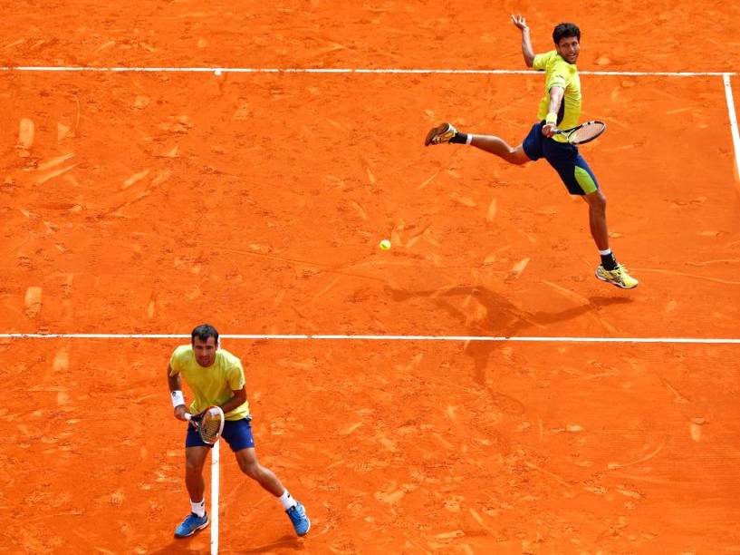 Marcelo Melo (à dir.) e Ivan Dodig venceram os dois duelos contra Bruno Soares e Alexander Peya em 2015