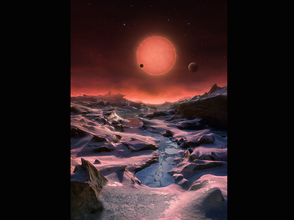 Ilustração de como seria a superfície de um dos planetas parecidos com a Terra que foram descobertos através do telescópio TRAPPIST