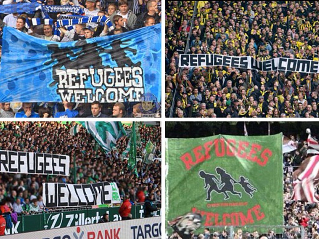 Torcedores de clubes alemães levam faixas aos estádios em apoio aos refugiados