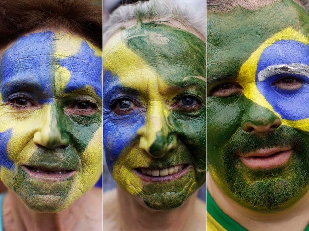 Manifestantes pintam o rosto nas cores do Brasil durante protesto contra o governo Dilma, em Belo Horizonte
