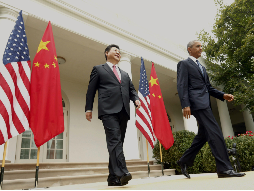 Os presidentes da China, Xi Jinping, e dos EUA, Barack Obama, na Casa Branca, em Washington