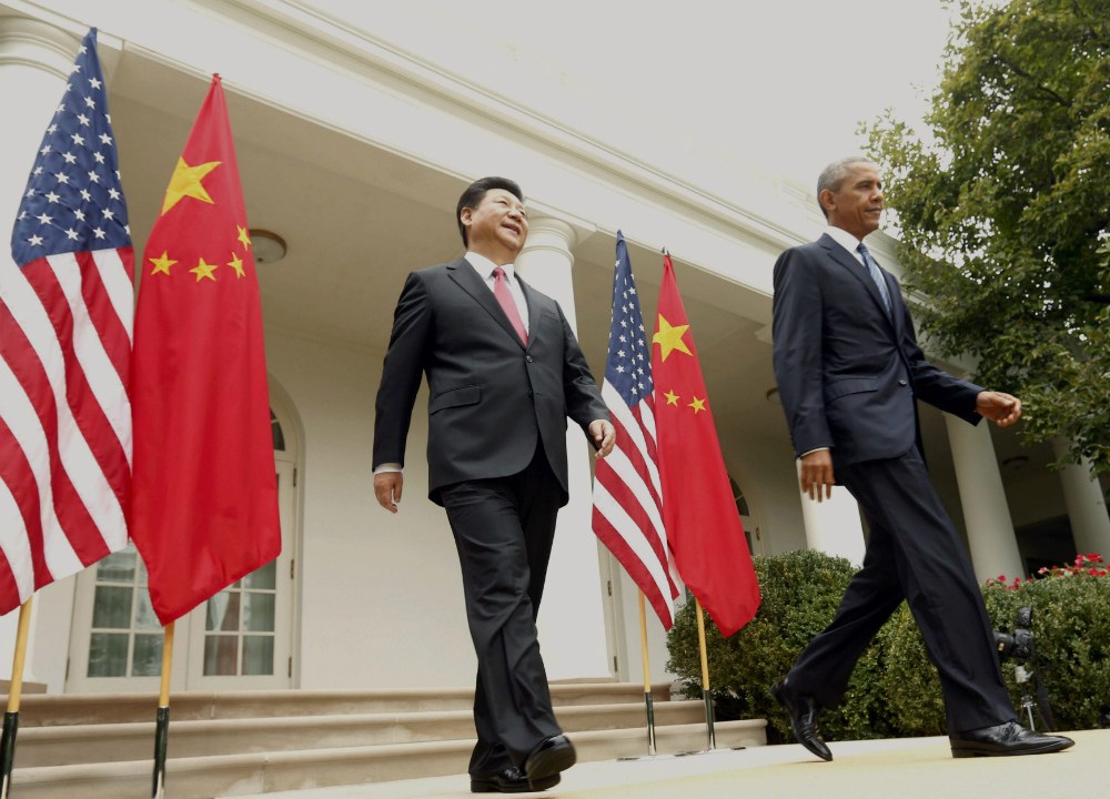 Os presidentes da China, Xi Jinping, e dos EUA, Barack Obama, na Casa Branca, em Washington
