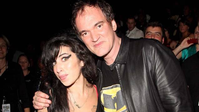 Amy Winehouse com o diretor de cinema Quentin Tarantino, durante o Music of Black Origin Awards, em Londres, 2007