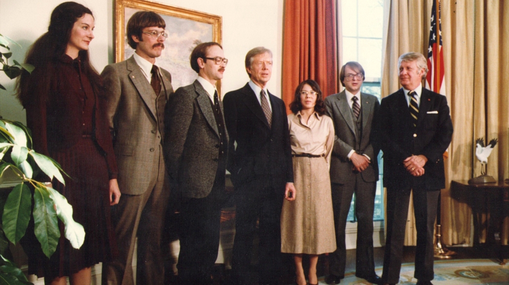 Americanos resgatados pela operação "Argo", ao lado do presidente Jimmy Carter