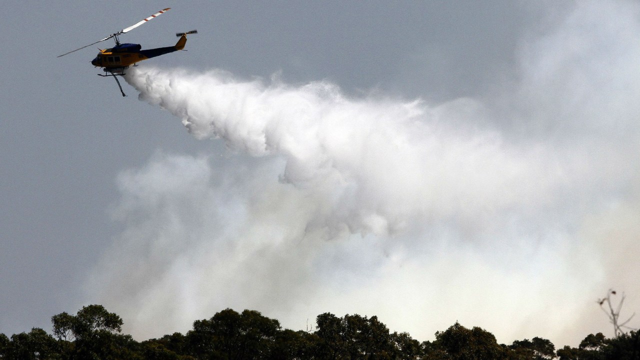 As equipes de bombeiros ainda não conseguiram controlar o incêndio florestal no estado de Nova Gales do Sul