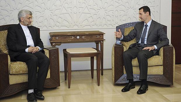 Assad apareceu na TV em reunião com enviado do Guia Supremo do Irã, Said Jalil