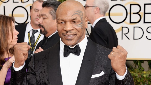 O ex-boxeador Mike Tyson chega para a premiação do Globo de Ouro, na Califórnia