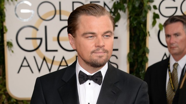 O ator Leonardo DiCaprio, concorrente ao troféu de melhor ator em filme cômico ou musical por O Lobo de Wall Street, de Martin Scorsese, no tapete vermelho do Globo de Ouro
