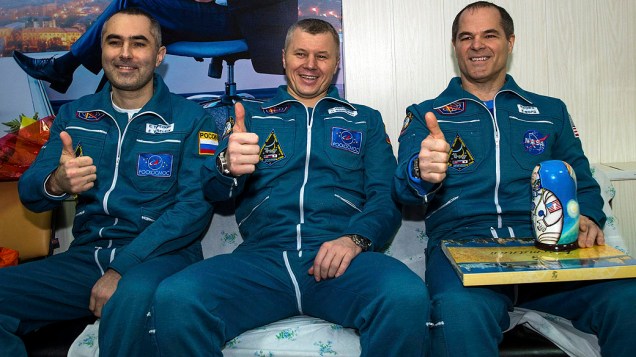 Evgeny Tarelkin, Oleg Novitskiy e Kevin Ford estavam na Estação Espacial Internacional na Expedição 34