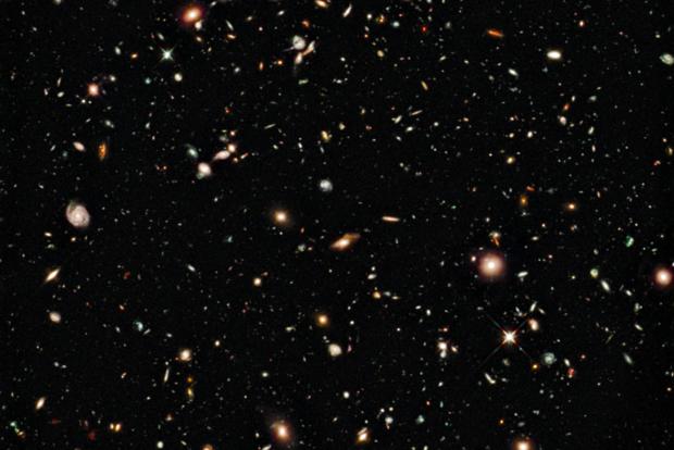 Os cientistas descobriram que as galáxias primitivas têm uma taxa de formação de estrelas muito menor que a nossa e possuem mais luz infravermelha do que o previsto anteriormente