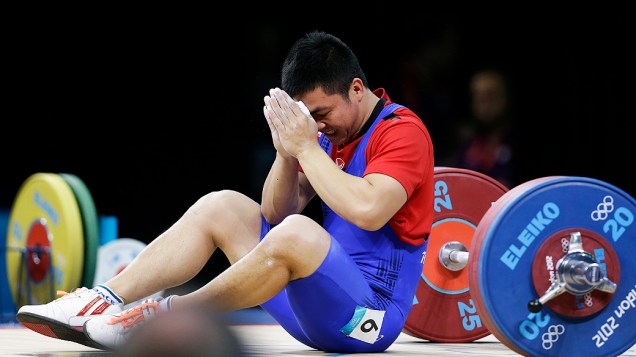 Atleta da Tailândia durante competição de levantamento de peso, em 31/07/2012