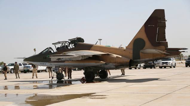 Caça russo chega à base aérea militar do Iraque, no aeroporto de Bagdá; As aeronaves serão utizadas para apoiar as tropas iraquianas a combater militantes islâmicos sunitas que tomaram o poder nas províncias ao norte do país