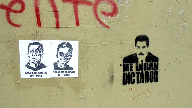 Rosto do Presidente Nicolás Maduro é pichado em um muro de Caracas com a palavra Ditador, na Venezuela