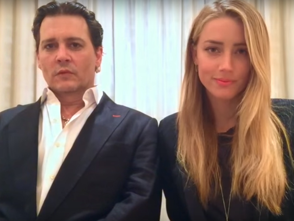 Johnny Depp e a esposa Amber Heard em vídeo de desculpas par Austrália
