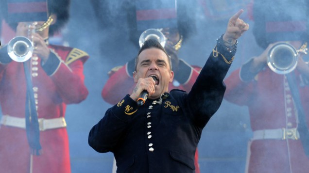 O cantor Robbie Williams durante show no Palácio de Buckingham