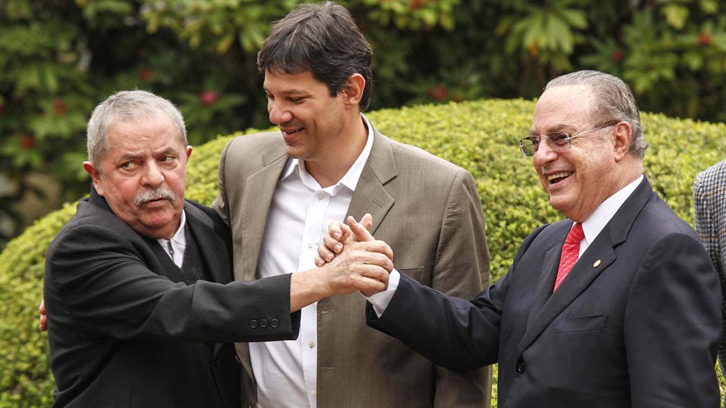 O ex-presidente Lula, o pré-candidato do PT, Fernando Haddad, e o deputado federal Paulo Maluf: inimigos históricos na mesma aliança