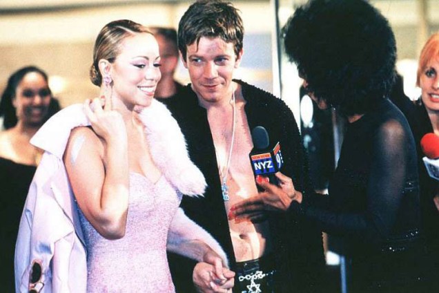 Mariah interpreta uma aspirante a cantora que luta para encontrar sua família, em <em>Glitter - O Brilho de uma Estrela</em> (2001).
