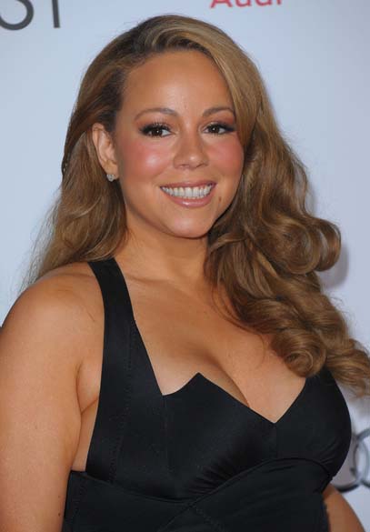 O modelo preto não foi o suficiente para disfarçar os quilos a mais de Mariah Carey na estreia do filme <em>Preciosa</em>, em 2009