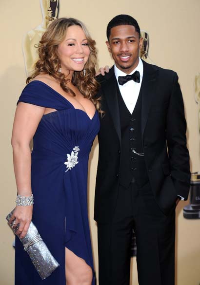No Oscar 2010, Mariah Carey não conseguiu esconder a forma voluptuosa ao lado do marido Nick Cannon