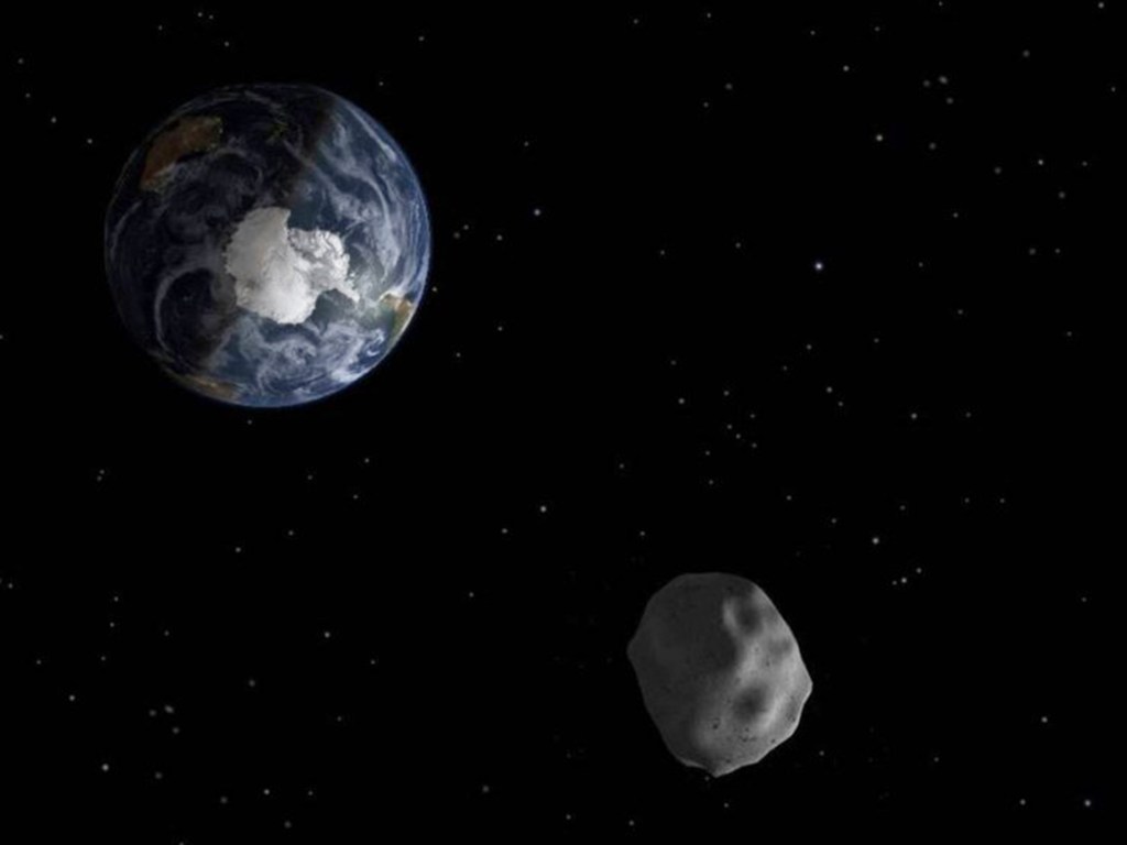 Em ilustração, Nasa mostra asteroide passando próximo à Terra, porém sem riscos de colisão com o planeta.