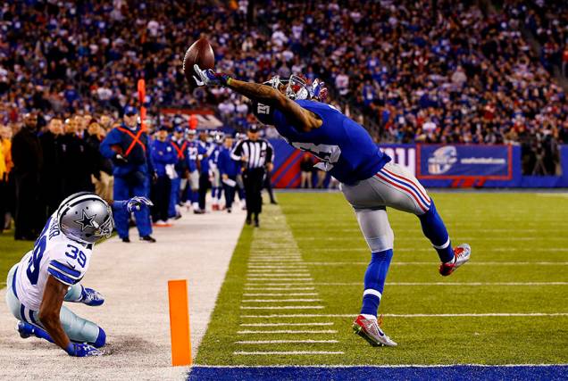 Ainda em Esportes, a foto do jogador do New York Giants conseguindo um touch-down, feita pelo norte-americano Al Bello, ficou em segundo lugar