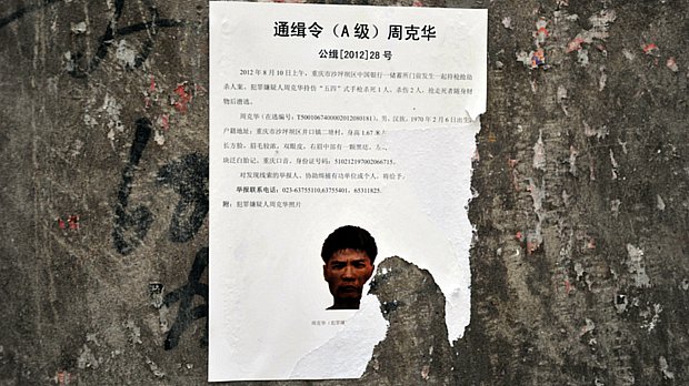 Zhou Kehua era procurado pela polícia há oito anos