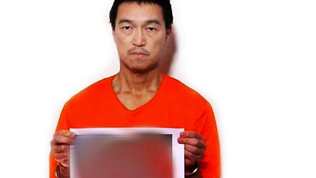 Imagem divulgada pelo SITE (grupo de monitoramente do terrorismo) mostra o refém japonês Kenji Goto