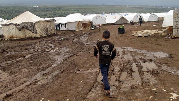 Menino sírio em campo de refugiados na Turquia