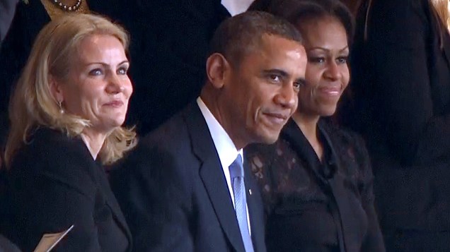 O presidente americano Barack Obama ao lado da mulher, Michelle (dir.) e da premiê dinamarquesa, Helle Thorning-Schmidt