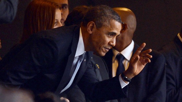 O presidente americano Barack Obama durante cerimônia religiosa de despedida de Nelson Mandela