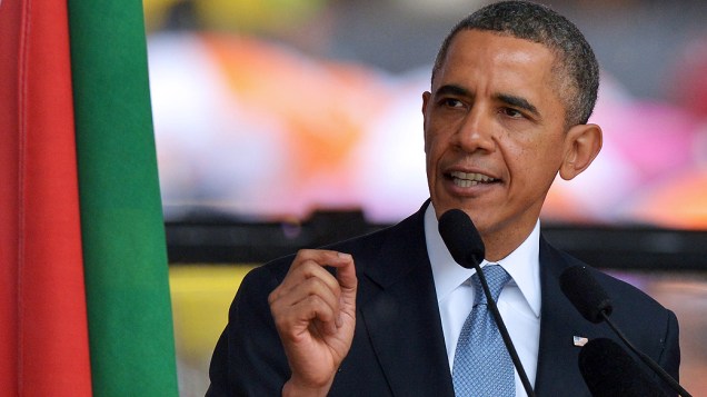 O presidente americano Barack Obama durante cerimônia religiosa de despedida de Nelson Mandela, nesta terça-feira (10)