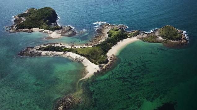 Ilha XXXX, Australia - A paradisíaca ilha está equipada com bar, sala de jogos e um campo de golfe