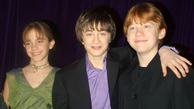 O trio de protagonistas, Emma Watson, Daniel Radcliffe e Rupert Grint, na premiere de <em>Harry Potter e a Câmara Secreta</em>, em Nova York, 2002