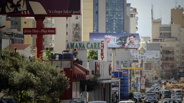 Outdoor com foto do presidente iraniano Mahmoud Ahmadinejad nas ruas de Beirute, no Líbano