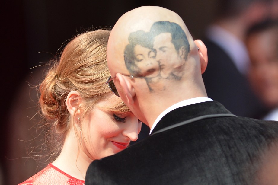 James Franco e Ahna OReilly chegam para a exibição do filme O Som e a Fúria, durante o 71º Festival de Veneza, na Itália
