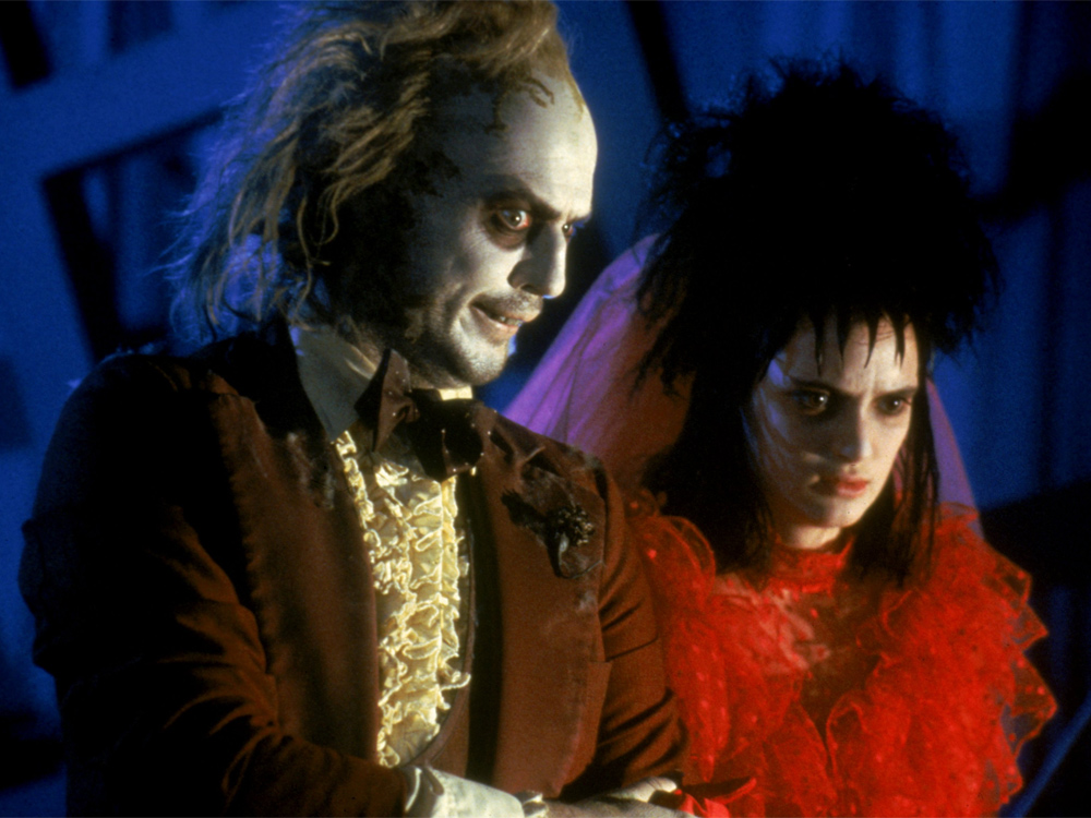 Michael Keaton e Winona Ryder no filme 'Os Fantasmas se Divertem' (1988), de Tim Burton