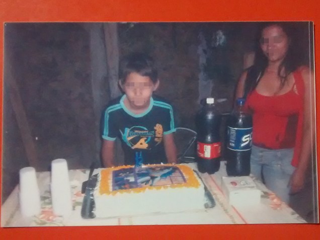 O menor I.V.I., de 15 anos em sua festa de aniverário O menor I.V.I., de 15 anos em sua festa de aniverário