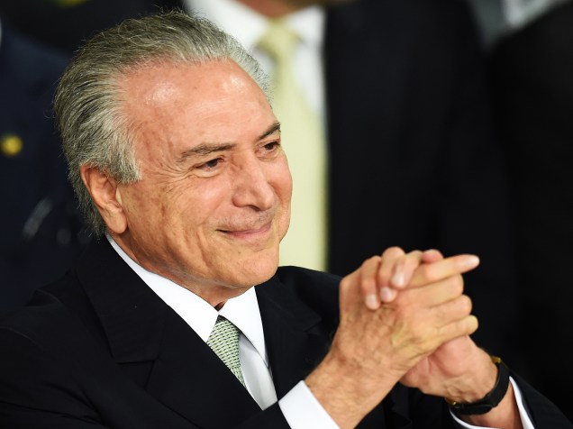 O presidente da República em exercício, Michel Temer, dá posse para o seu novo ministério em cerimônia no Palácio do Planalto, em Brasília (DF) - 12/05/2016