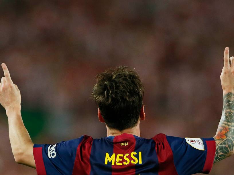 O jogador Lionel Messi do Barcelona, comemora o gol durante a partida contra o Athletic Bilbao pela final da Copa do Rei da Espanha