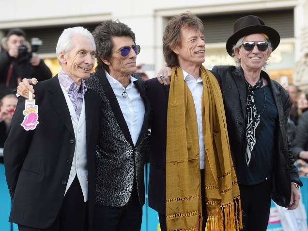 Charlie Watts, Ronnie Wood, Mick Jagger e Keith Richards (esq. para dir.), atuais integrantes da banda, na abertura da exposição Exhibitionism: The Rolling Stones