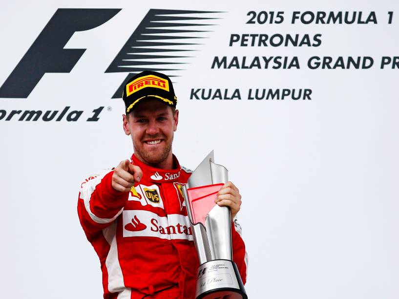 O alemão Sebastian Vettel comemora vitória pela Ferrari no GP da Malásia - 29/03/2015